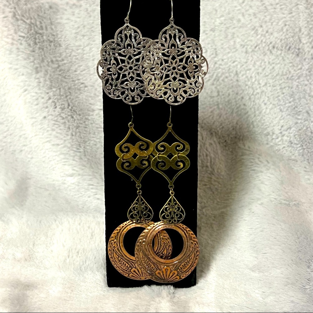 Claire’s mixed metal earring trio